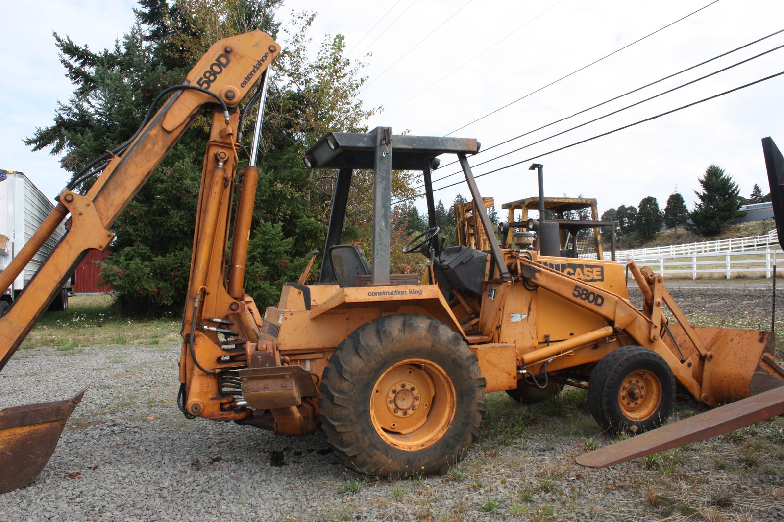 Case backhoe loader heavy equipment serviced by Cascade Farm and Fleet Services